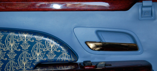 Illustration for article titled Christian Audigier Creates Snorkel-Nosed Custom Cadillac Escalade
